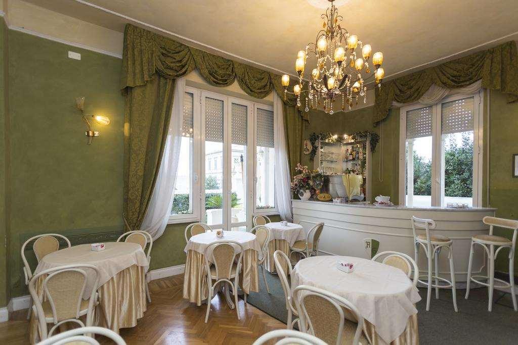 ליבורנו Hotel Gennarino מסעדה תמונה