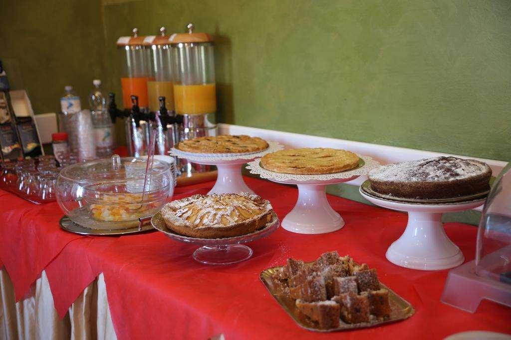 ליבורנו Hotel Gennarino מסעדה תמונה