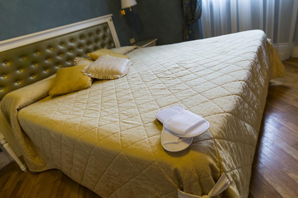 ליבורנו Hotel Gennarino חדר תמונה