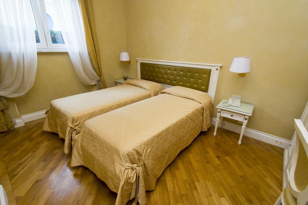 ליבורנו Hotel Gennarino חדר תמונה